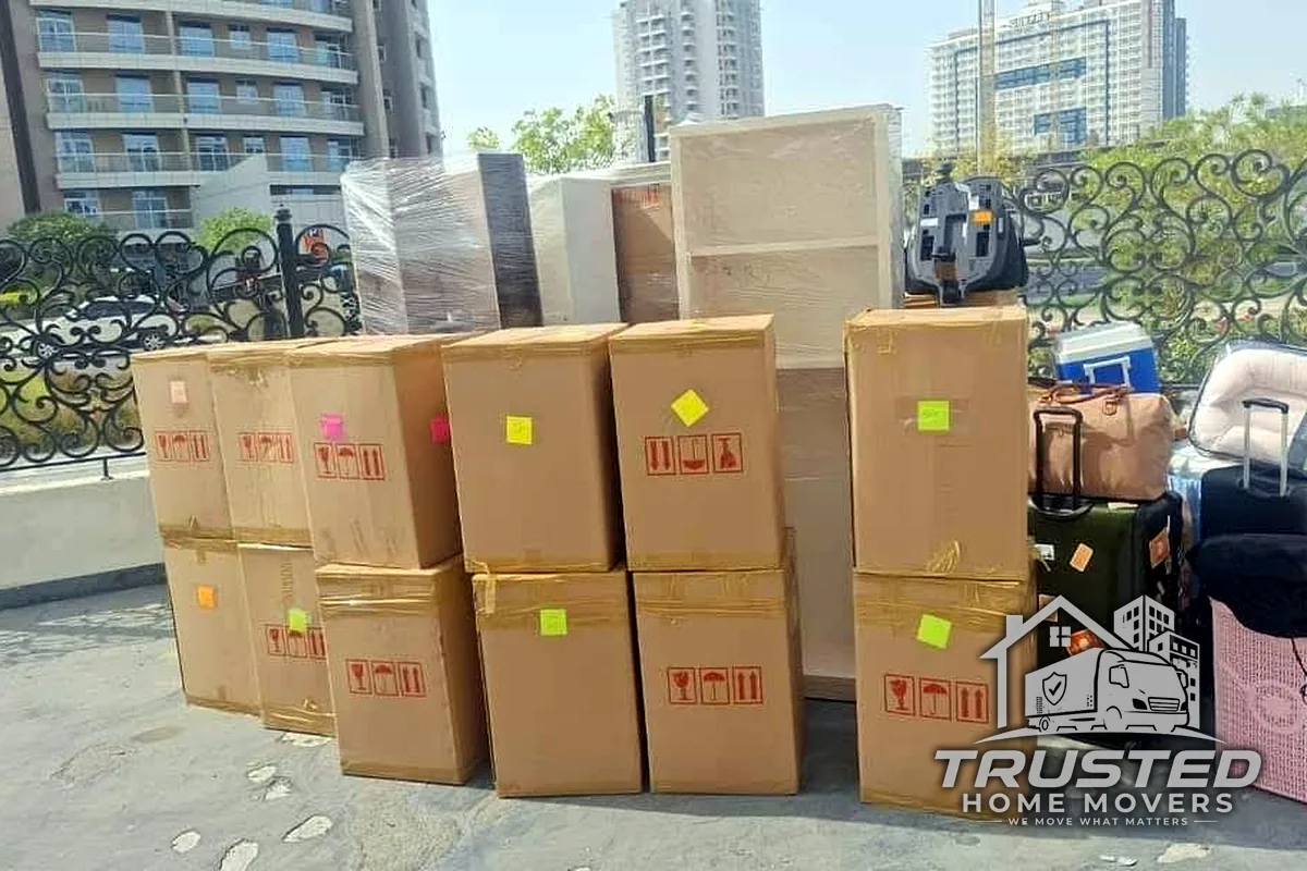 Neatly organised and labelled moving boxes ready for relocation by Trusted Home Movers across the UAE
