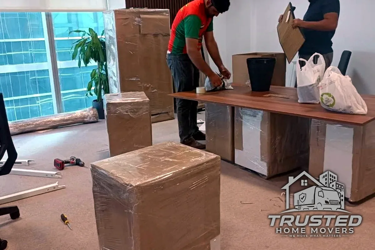 The Trusted Home Movers team carefully packing a customer's belongings in the UAE
